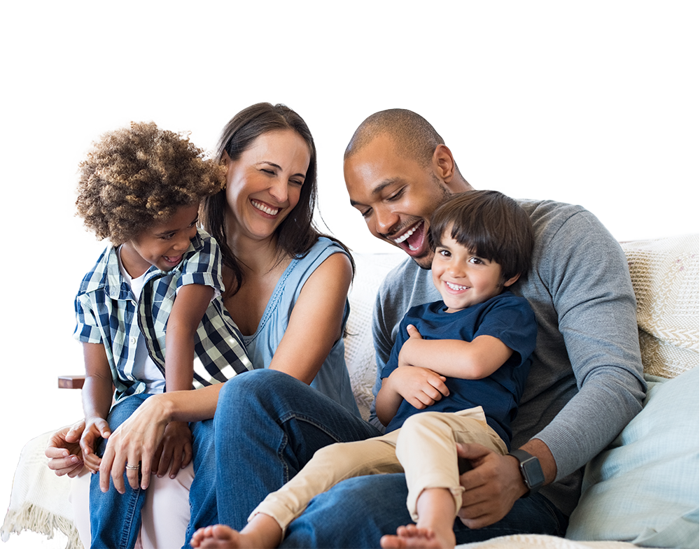 Happy interacial family sitting on couch